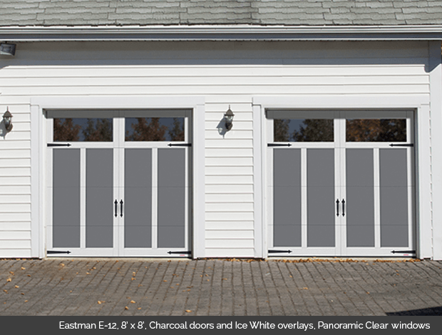 Eastman E-12 Charcoal Garaga garage doors with Ice White overlays and Panoramic clear windows