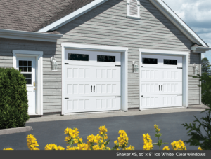 Shaker XS Garaga garage door in Ice White with clear windows